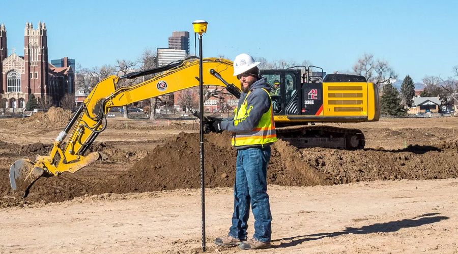 Surveyor on construction site