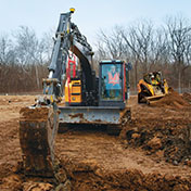 Excavator with Trimble Siteworks Machine Guidance operating on a construction site