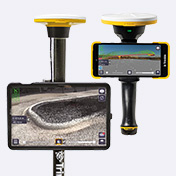 Trimble SiteVision augmented reality software displayed on mobile devices including a phone and tablet on the Trimble DA2 GNSS smart antenna